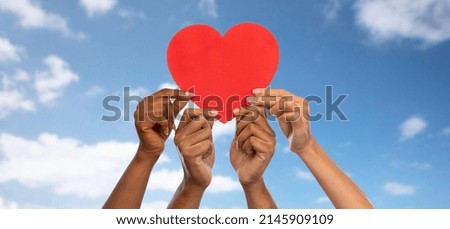 Image, Stock Photo red heart on the delineator