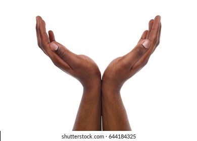 Charity, protection and care concept. Black male hands keep empty cupped palms together isolated on studio white background