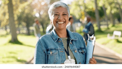 Charity, woman and portrait of volunteer with clipboard for waste checklist, inspection and community service. Female manager, park or nature for cleaning, nonprofit project and welfare with smile - Powered by Shutterstock