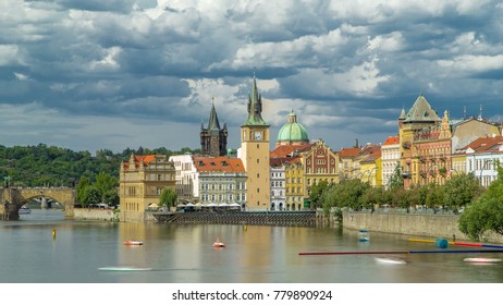 Charles Bridge and historical buildings timelapse in Prague from across the river. Old Town Watereworks Tower, Staromestsky water tower. Prague, Czech Republic. - Powered by Shutterstock