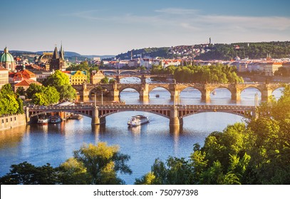 Charles Bridge (Karluv Most) and Lesser Town Tower, Prague in summer at sunset, Czech Republic