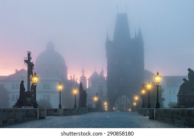 Charles Bridge landmark at sunrise in Prague at foggy morning - Powered by Shutterstock