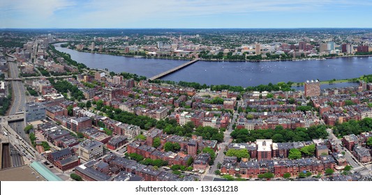Charles River aerial view panorama with Boston midtown city skyline and Cambridge district.