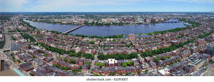 Charles River aerial view panorama with Boston midtown city skyline and Cambridge district.
