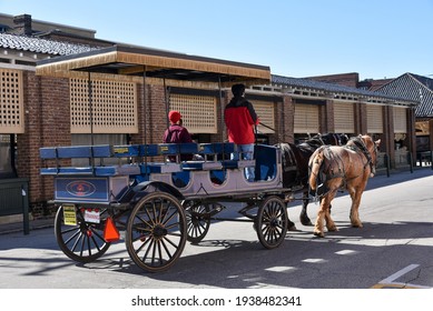 Charleston, SC, USA - February 08 2021: Horse-drawn Carriage Touring The Streets Of Historic Charleston South Carolina.