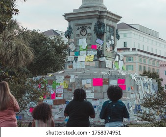 Charleston, SC / USA - June 17, 2020: Onlookers and Protesters Gather at the John C. Calhoun Statue