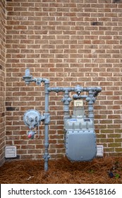 Charleston, South Carolina, USA; 4-2019: Gas Meter And Pressure Regulator