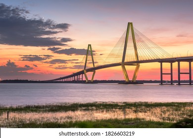 Charleston, South Carolina, USA at Arthur Ravenel Jr. Bridge at dusk.