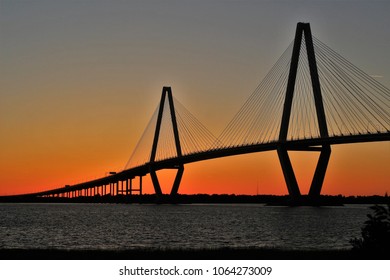 Charleston, South Carolina / USA -May 7, 2017:  The Arthur Ravenal  Bridge crossing over the  Copper River at sunset