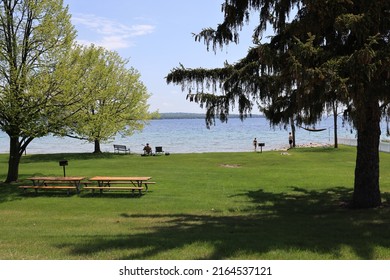 Charlevoix, MI, USA - May 29, 2022:  Early Summer Outdoor Activity Along The Shore Of Lake Charlevoix In Northern Michigan.