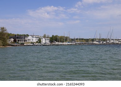 Charlevoix, MI, USA - May 29, 2022: Early Summer Outdoor Activity Along The Shore Of Lake Charlevoix In Northern Michigan.