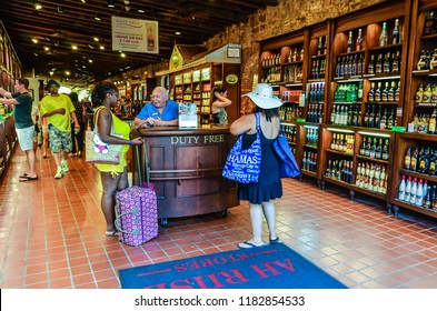 Charlotte Amalie, St. Thomas, US Virgin Islands / USA - October 1, 2013: Tourists Shopping At A Duty Free Liquor Store In Charlotte Amalie On The Island Of St. Thomas In The U.S.Virgin Islands.