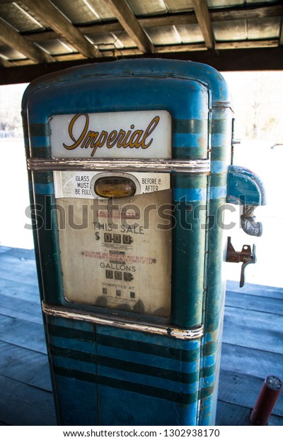 Charlotte, NC -\
February 2, 2019 - Vintage Imperial gas pump (Gilbarco Calco-Meter)\
at old general store