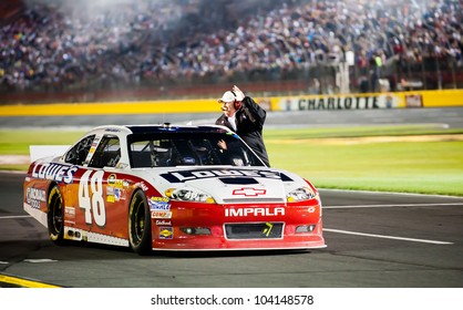 CHARLOTTE, NC - MAY 19: Owner Rick Hendrick Gets A Lift From Winner Jimmie Johnson At The Nascar All Star Race At Charlotte Motorspeedway In Charlotte, NC On May 19, 2012