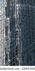 Charlotte, NC - September 24, 2022: The Bank Of America Corporate Center In Charlotte Reflected In A Nearby Building