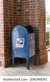 Charlotte, NC - September 3, 2021: Blue Metal Free Standing US Post Office Mail Box