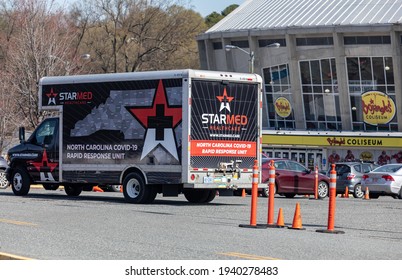 Charlotte, NC USA - March 20,  2021: Starmed Healthcare Covid-19 Truck Outside Bojangles Coliseum. Starmed Vaccinates Hundreds Of People Everyday.