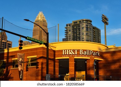 Charlotte NC /USA-May 09 2020 - The Entrance Of The BB & T Baseball Park At The Intersection Of W.martin Luther King Jr Blvd And The Charlotte Skyline At Sunset.