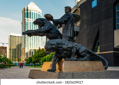 Charlotte NC/USA-May 09,2020: Jerry Richardson Statue  Was Located Outside Of The Carolina Panthers, Bank Of America Stadium. Bank Of America Building Can Be Seen Behind The Statue.