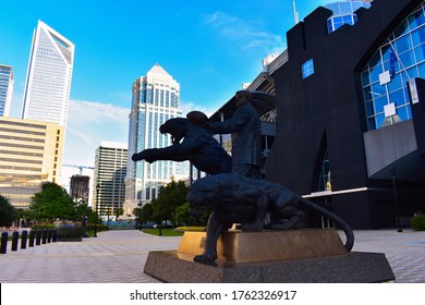 Charlotte NC/USA-May 09,2020:The Jerry Richardson Statue That Was Located Outside Of The Carolina Panthers, Bank Of America Stadium Was Removed. Bank Of America Building Can Be Seen Behind The Statue.