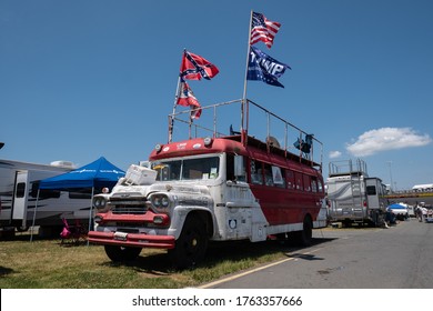 Charlotte, North Carolina / USA - May 20th 2017: A NASCAR Fans RV Parked In The Infield At Charlotte Motor Speedway. Confederate Flag And Trump Flags Flying High