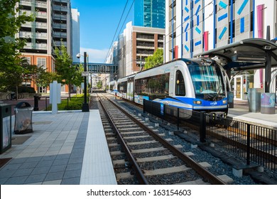 Charlotte, North Carolina USA - October 10, 2013: The popular Charlotte Area Transit System servicing 23 million yearly trips arriving at the uptown Seventh Street station.