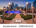 Charlotte, North Carolina, USA uptown skyline and park at night.