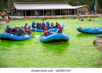 Charlotte, North Carolina/USA - March 16, 2019: The Annual Green River Revival Festival At The U.S. National Whitewater Center Where Every Year They Dye The Water Green To Celebrate St. Patrick's Day.