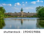 Charlottenburg Palace in Berlin, Germany water reflection on sunny summer day