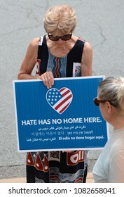 CHARLOTTESVILLE, VA–July 8, 2017: Counter protesters and clergy gather early to prepare, organize and to pray for peace at a local church. Later members of a NC KKK group will rally in a nearby park.