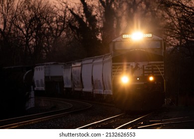 CHARLOTTESVILLE, UNITED STATES - Jan 15, 2022: A Norfolk Southern train approaches the station at Charlottesville just before dawn