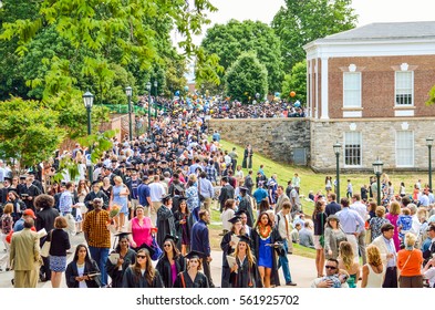 Charlottesville, USA - May 18, 2014: Crowd of people walking by amphitheater at graduation ceremony at University of Virginia