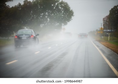 Charlottesville, USA - October 25, 2020: Toyota Yaris Car On Highway Road Traffic During Heavy Rain In Autumn Fall Season In Virginia With Dangerous Slippery Road