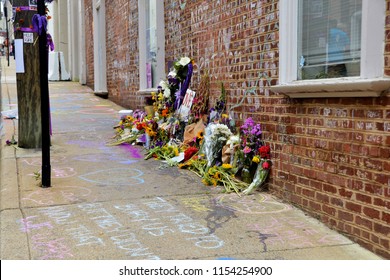CHARLOTTESVILLE, VA – Aug 11, 2018: Flowers are left at the site where Heather Heyer was killed on the one-year anniversary of a rally that turned violent. 