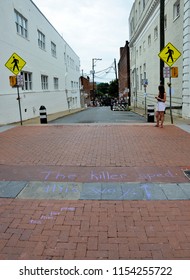 CHARLOTTESVILLE, VA – Aug 11, 2018: Chalked Messages At The Site Where Heather Heyer Was Killed On The One-year Anniversary Of A Rally That Turned Violent. 