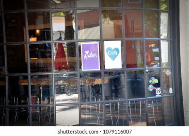 CHARLOTTESVILLE, VA - August 2017: Signs In Support Of Heather Heyer Are Placed Are Placed In Local Charlottesville Businesses. Heyer Was Killed When A Car Plowed Into A Crowd Of Protesters. 