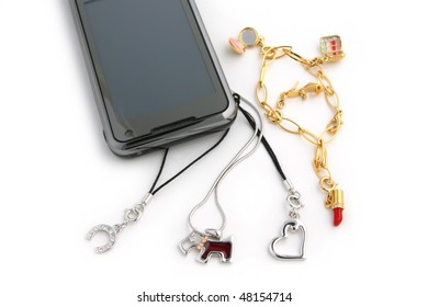 Charm Hanging From Cell Phone. Isolated On White Background.