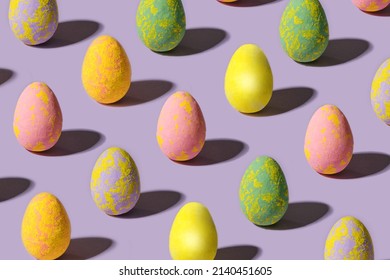 Charming abstract easter minimal concept. Lovely broken pattern made of unique colored eggs against purple background - Powered by Shutterstock - Get 15% off with code: PIKWIZARD15