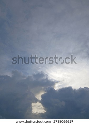 charming background of wispy clouds and dazzling light