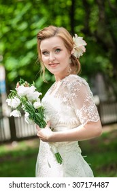 Charming Bride In Vintage Dress With French Braids, And A Sweet Smile, A Wedding Day