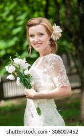 Charming Bride In Vintage Dress With French Braids, And A Sweet Smile, A Wedding Day