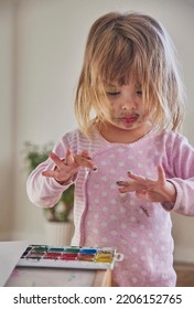 Charming Child Draws And Stains Everything With Paints