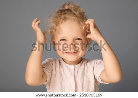 Similar – Image, Stock Photo A blonde with curly hair communicates via video link on a laptop sitting in front of a window