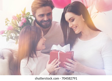 Charming Cute Girl Giving Her Mom A Present