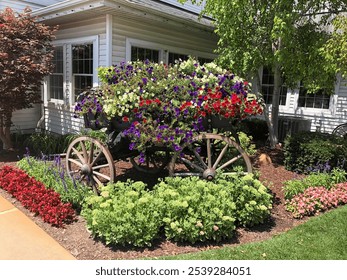 A charming display of vibrant flowers overflowing from a vintage wagon, set against a picturesque backdrop of a well-kept garden. The mix of colorful blooms creates an inviting and cheerful atmosphere - Powered by Shutterstock