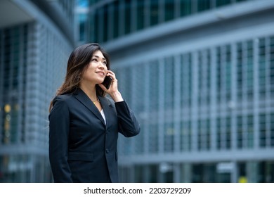 Charming And Elegant Japanese Woman Engaged In A Phone Call, Concept Of Success In Business, Ransom And Successful Entrepreneurship Of Women