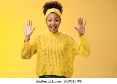 Charming Excited Smiling Friendly Millennial African-american Girl Raise Hands Nothing Hide Show Palms High Surrender Standing Amused Thrilled Grinning Having Fun Posing Yellow Background