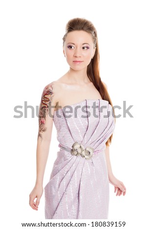 Charming girl in a lilac dress. Mixed race Asian Caucasian girl.