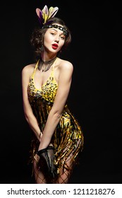 Charming girl posing in burlesque style outfit.