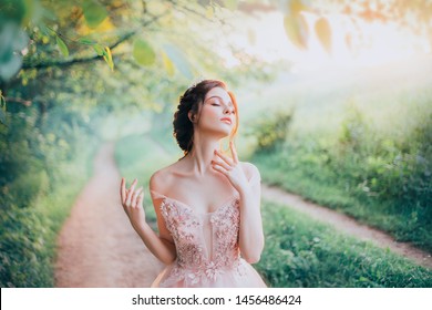 charming goddess young beautiful woman. spring summer forest enjoys natural cosmetic lady happy love eyes closed strokes neck fingers. Fantasy art portrait nude delicate gentle makeup. Light haze park